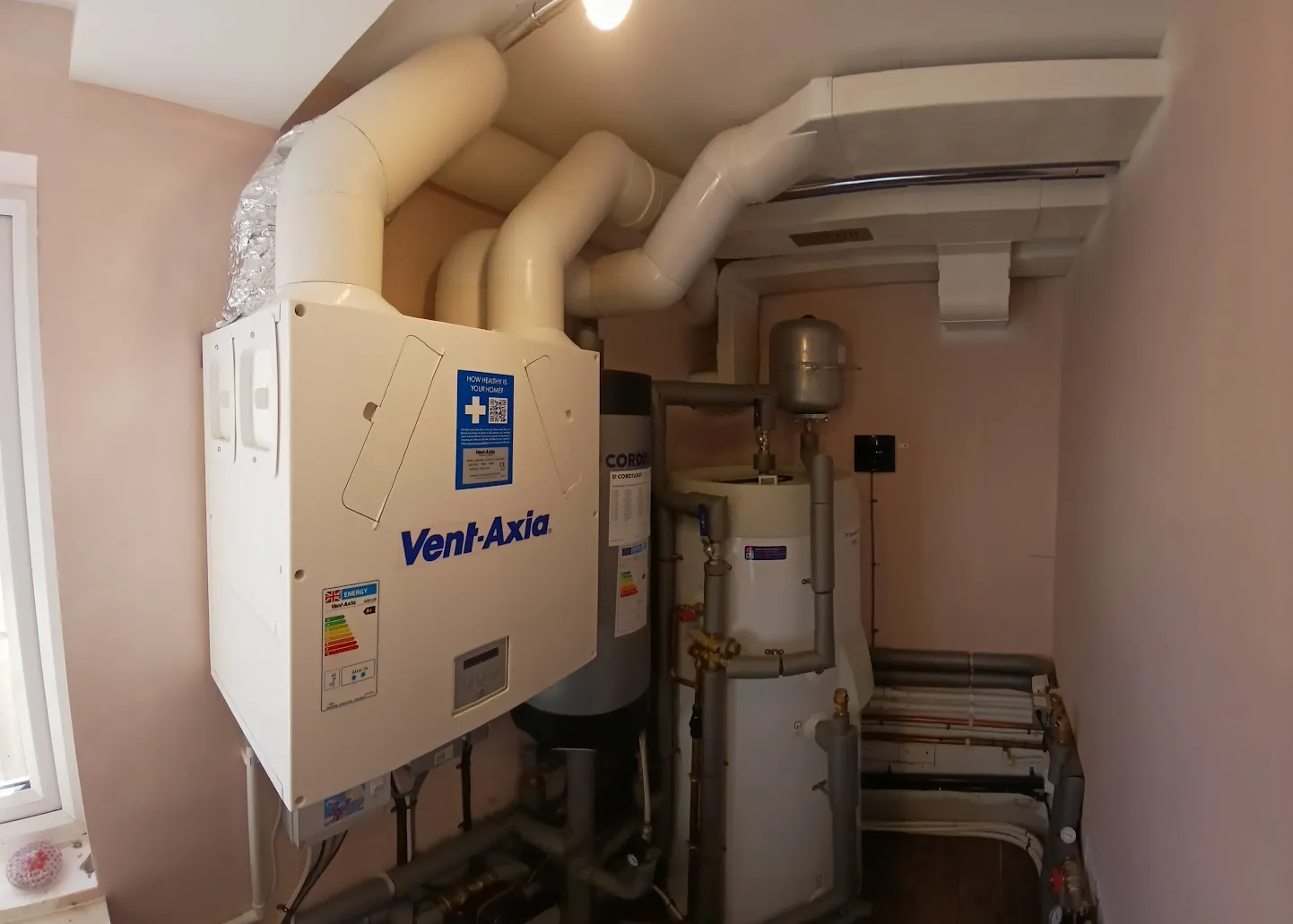 Properly installed Vent-Axia MVHR system after professional commissioning Example Vent-Axia Sentinel Kinetic MVHR setup in new-build flat